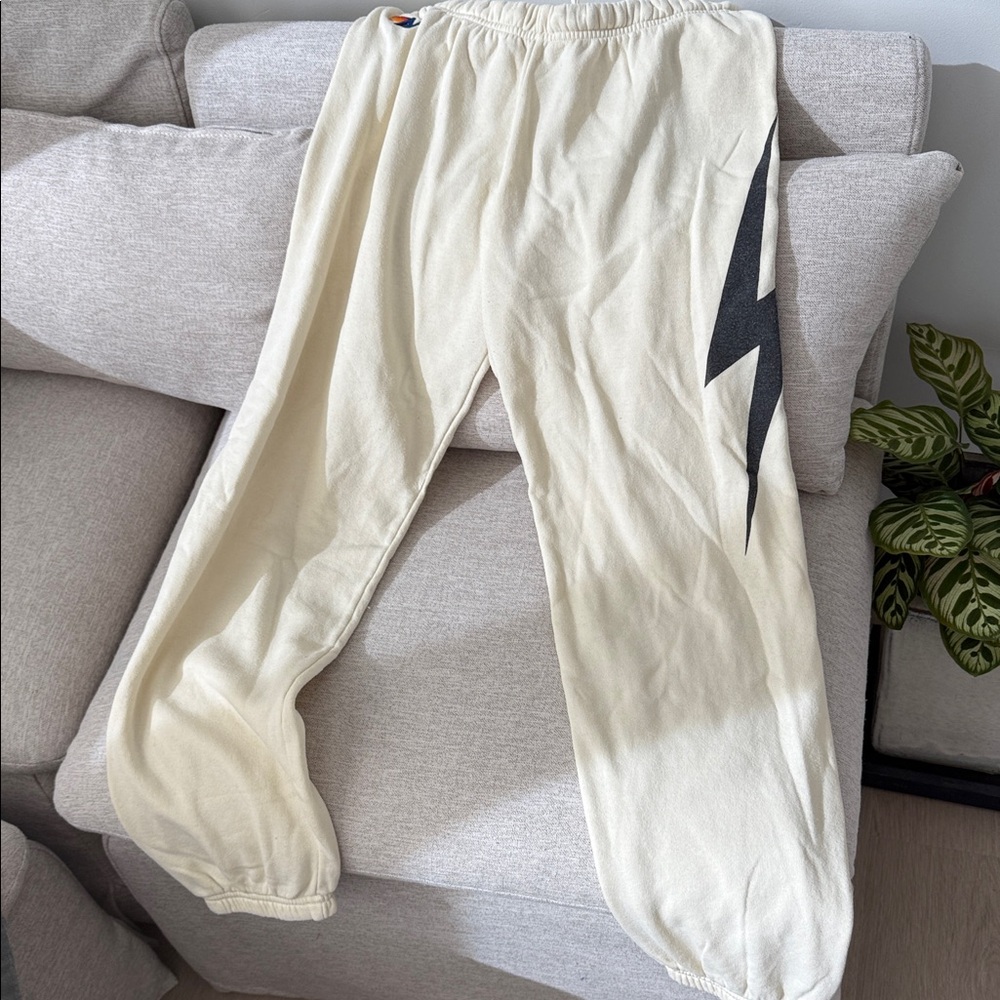 Aviator Nation Cream Joggers with Black Lightning Bolt